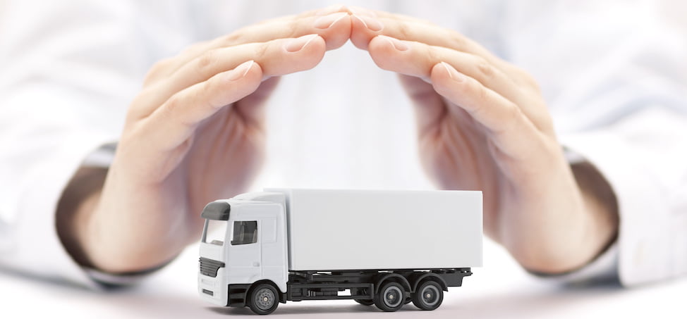 hands arched over toy moving truck