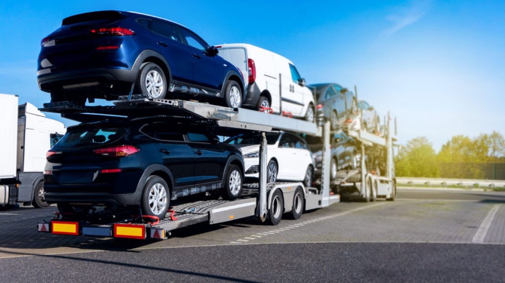 A trailer carrying cars