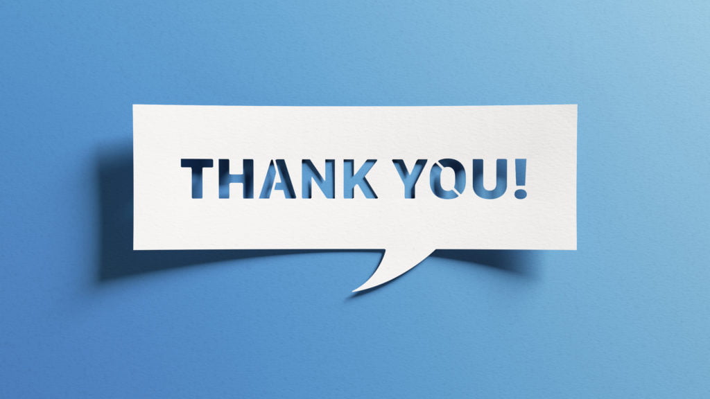 A white speech bubble containing the words "thank you" written in capital letters set against a blue background