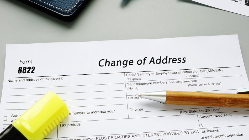 writing where to change address form with pencil