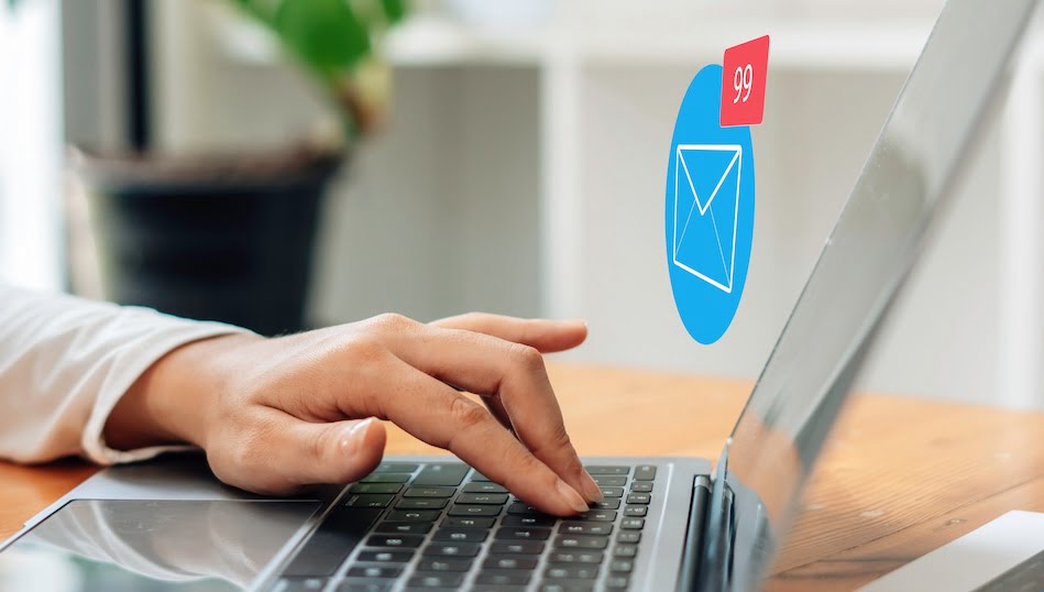 person on laptop to forward mail