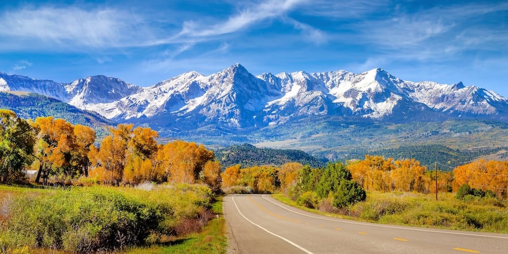 Scenic mountain scape for moving guide to Colorado